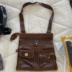 Roots cross body purse